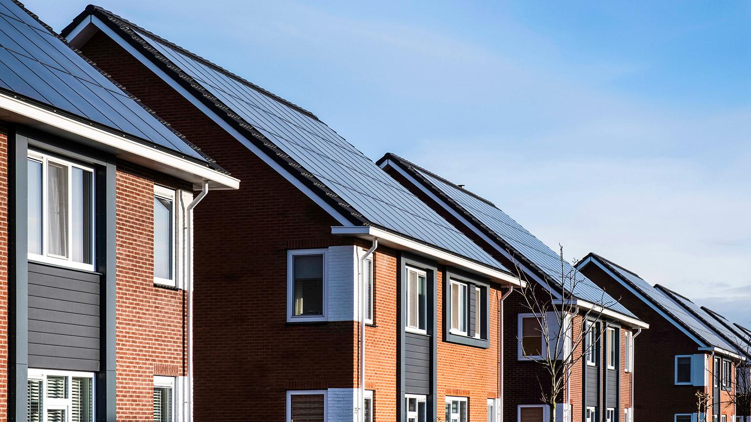 Modern homes with solar panels on the roof