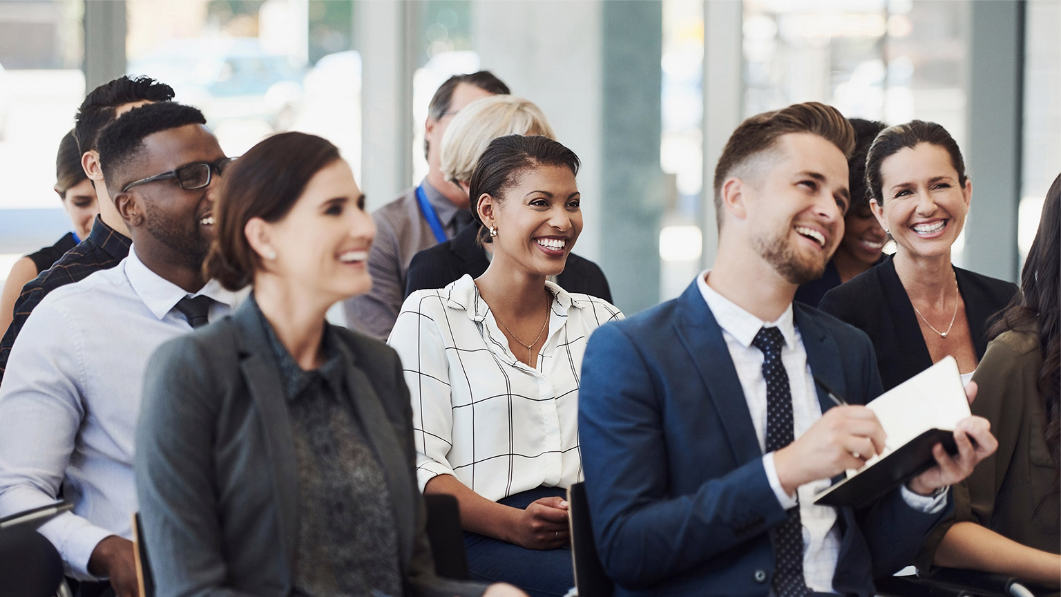 Shot of a group of businesspeople attending a conference