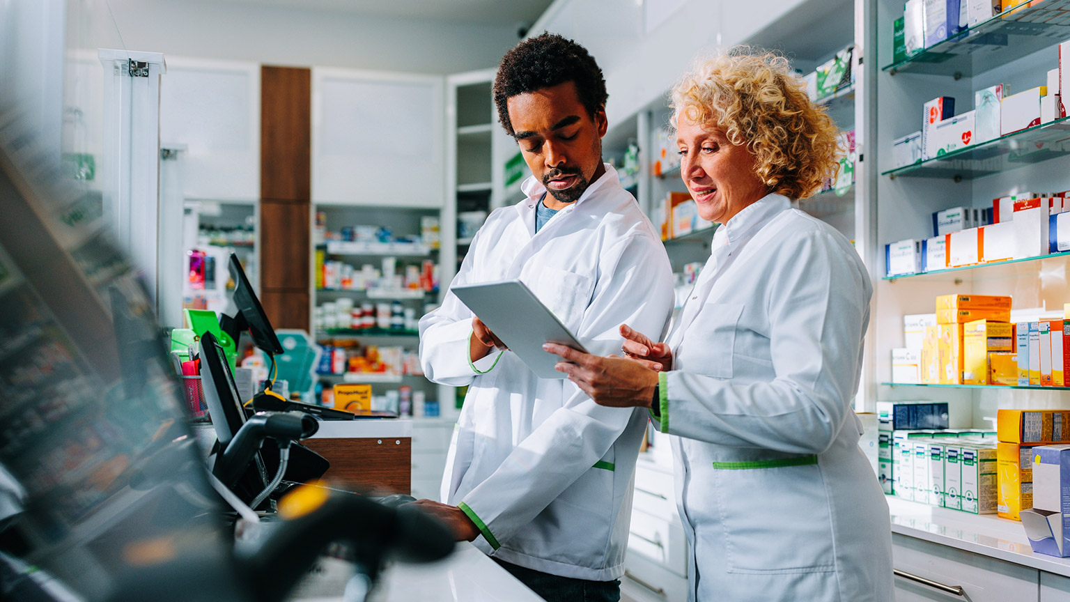 Two pharmacists communicating