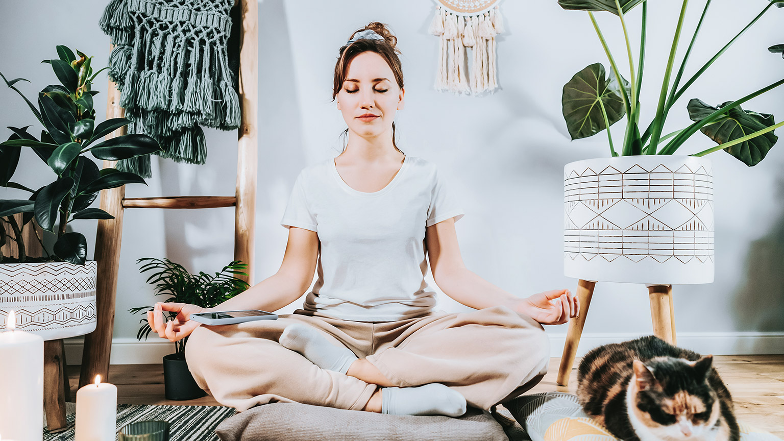 Meditating with dog beside her