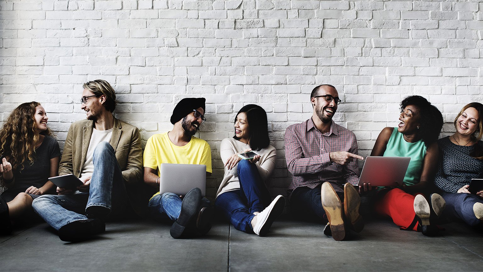 Diverse group talking to each other