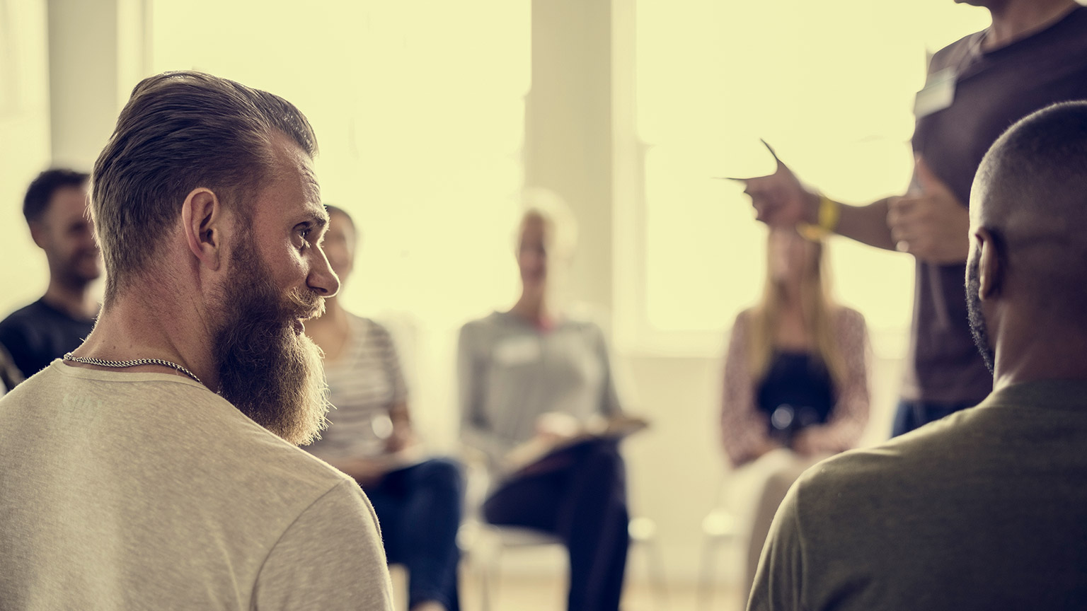 people having a group meeting session