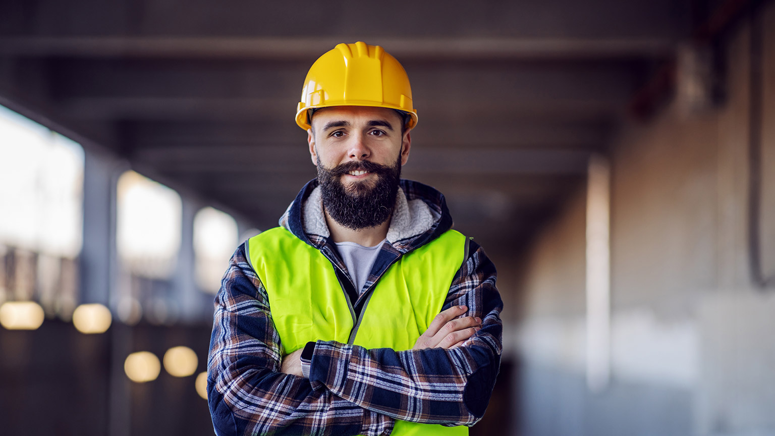 A smiling construction worker