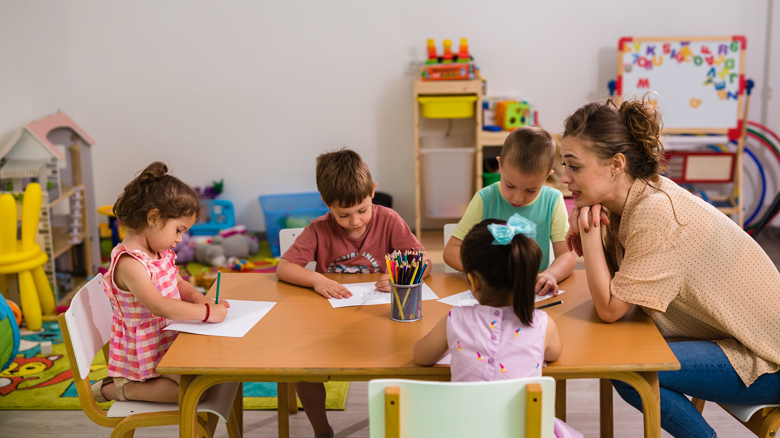 A kindergarten teacher with kids