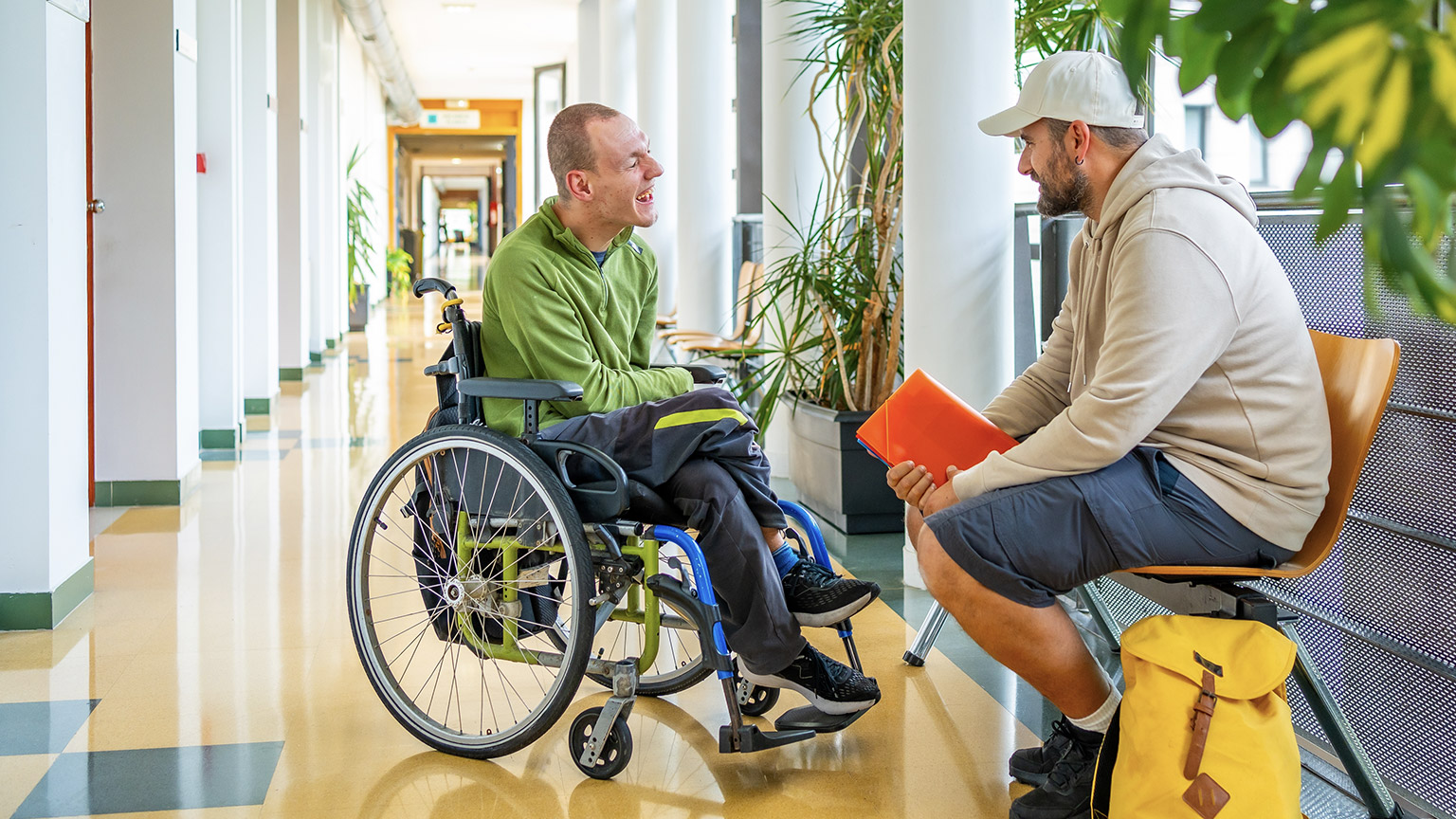 A support worker with a client