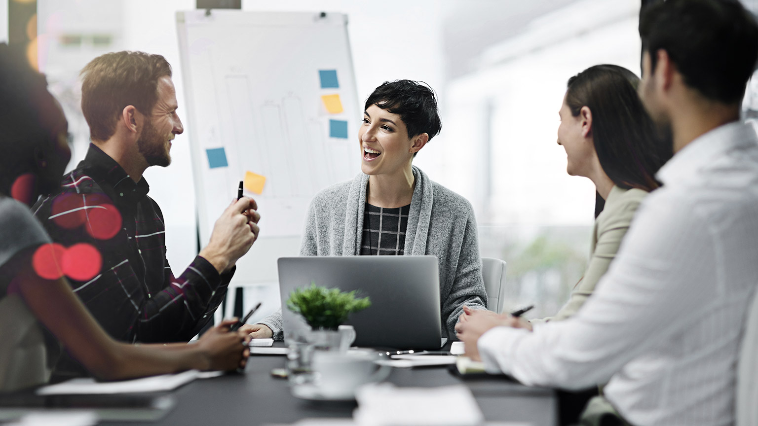 Colleagues on meeting and presentation at the office