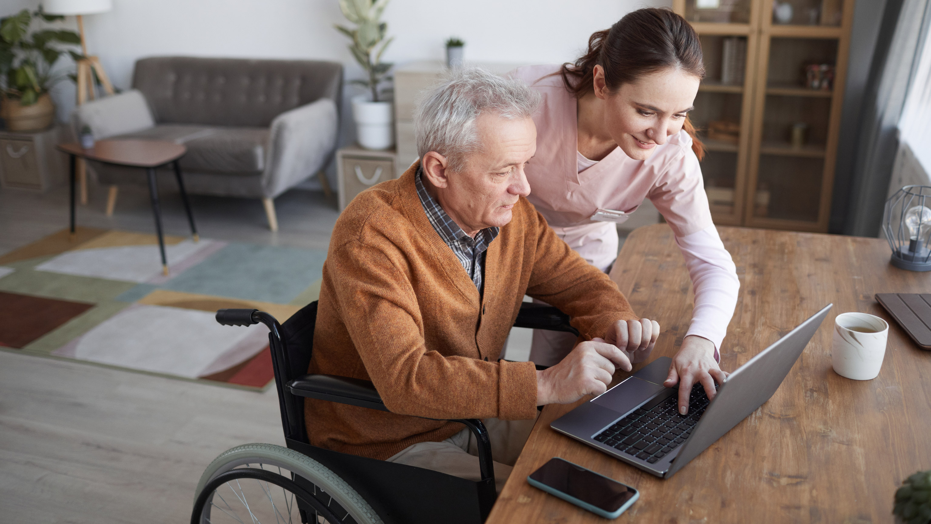 A carer helping a client