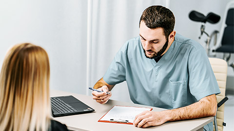 health practitioner assessing young girl's health