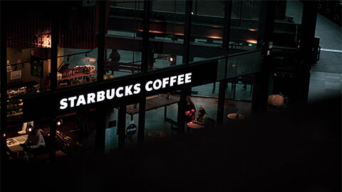 A Starbucks cafe nestled in a larger shopping complex