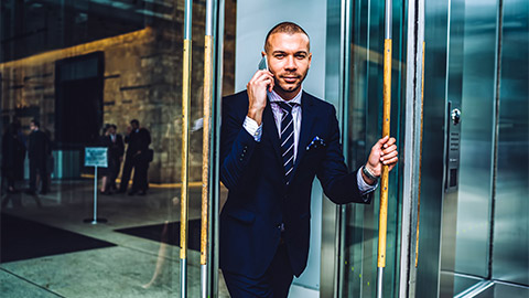 A financial broker on the phone with a client, establishing the terms of a line of credit