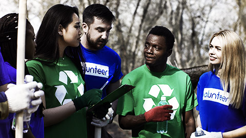 A group of professionals doing volunteer work