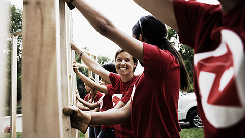 Volunteers talking with each other