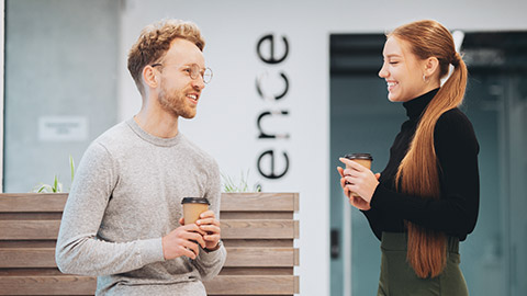 Colleagues talking in an office