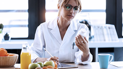 Dietitian checking the label