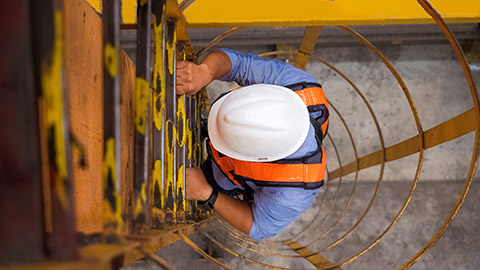 A top down view of an electrician on a work site