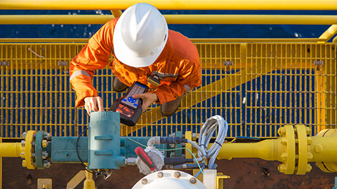 Top down view of an electrician working on a site