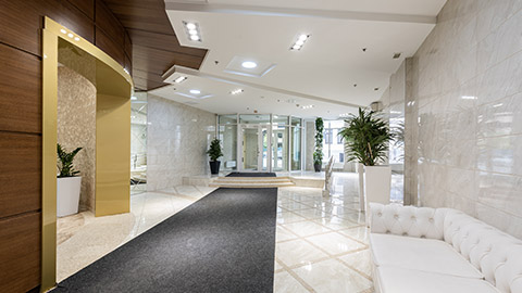 A wide shot of a hotel lobby