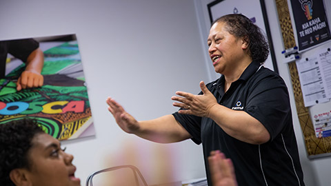 An instructor talking to students