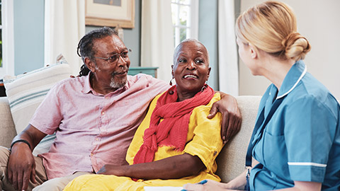 A health care worker with 2 clients