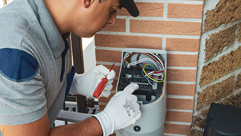 An electrician working on site