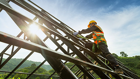 A worker on a roof