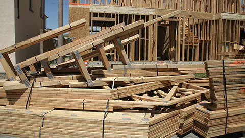 A large pile of construction materials on a building site