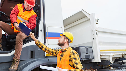 A person delivering goods to a work site