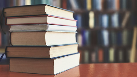 A stack of books on a table