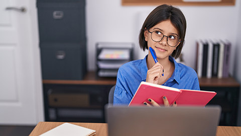 A child pretending to be an adult businessperson