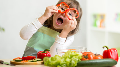 A child eating vegetables