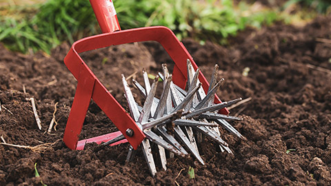 A garden implement for tilling