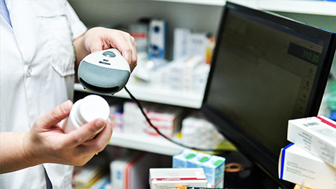 A pharmacist dispensing medicines