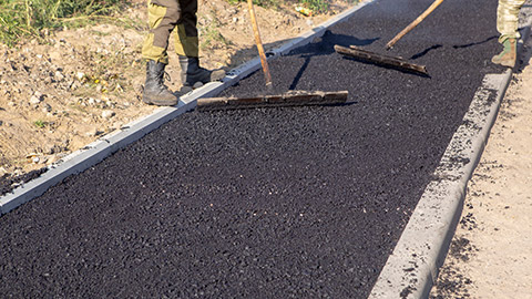 People laying a footpath