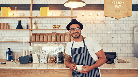 The owner of a coffee shop in his business