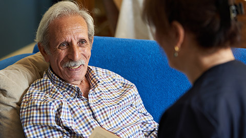 A carer talking to a client