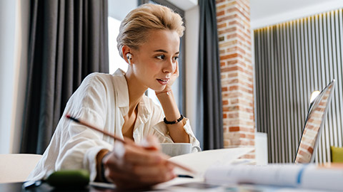 A business owner working on plans