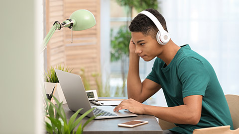 A student using a laptop