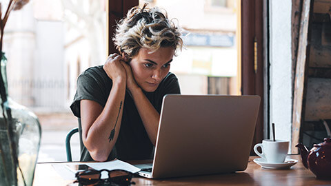 A youth mentor reading online information