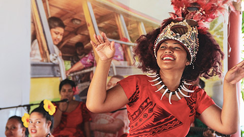 A girl performing a Samoan cultural dance