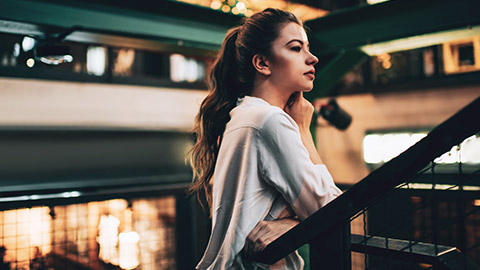 A women deep in thought, self-evaluating life