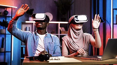 Two people using VR headsets