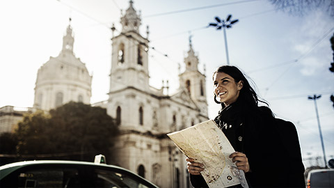 A person with a physcal map in hand