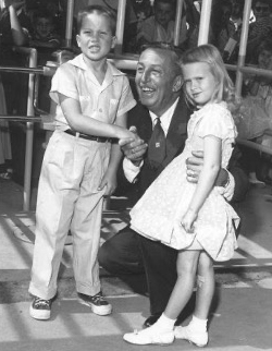 Walt Disney with two children