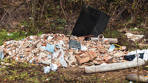 A pile of rubbish near a building site