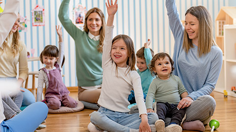 Parents taking part in the activities for preschool children