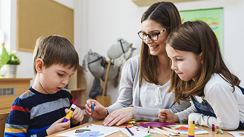 Teacher with Children at Kindergarten - Creative Art Class