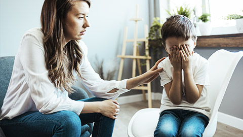 a teacher and a student sharing a sad story