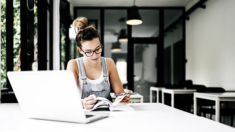 a person researching and reading