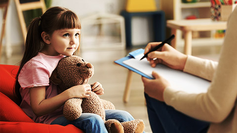 a child communicating to an educator