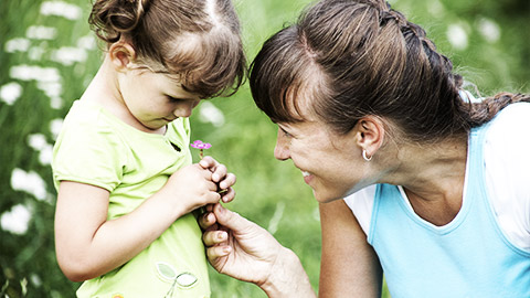 an adult consoling a child